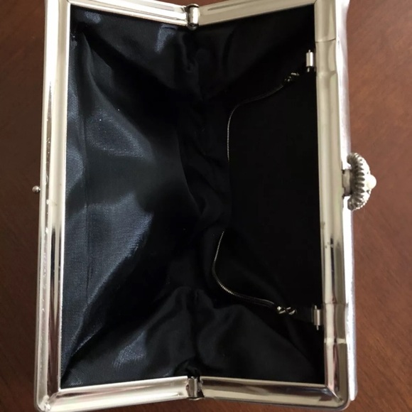 Chic Black Wristlet with Sleek Design and Metallic Accents - Picture 9 of 16